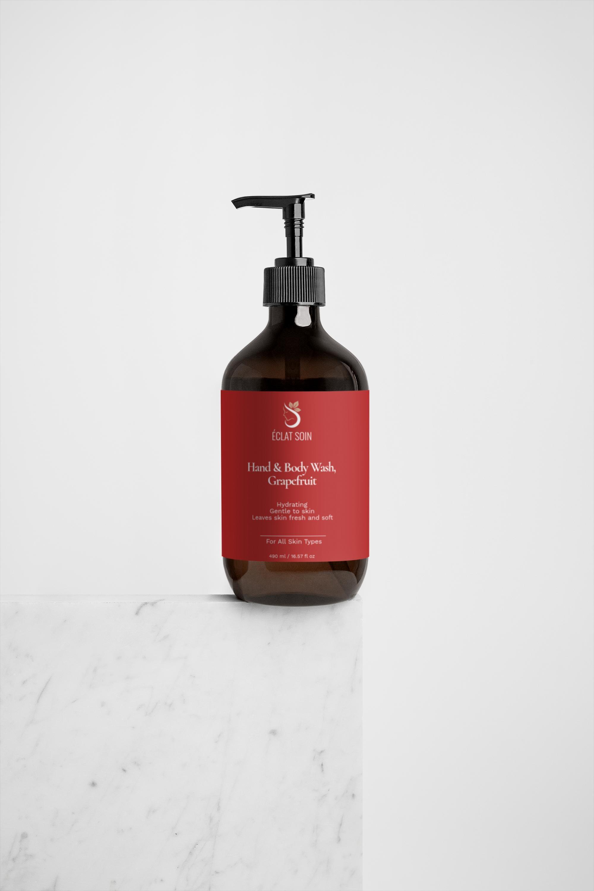Eclat Soin Natural Hand and Body Wash Grapefruit in a stylish amber bottle with a pump